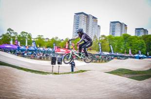 Year 9 Charlie riding a BMX bike in a race