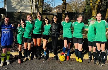Year 7/8 Girls Football Team smiling